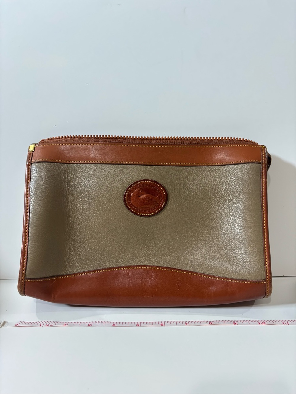 Dooney & Bourke Taupe and Brown Leather Trim Pouch